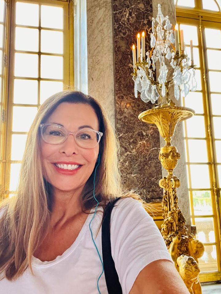 The author at the Palace of Versailles in France in August 2022.