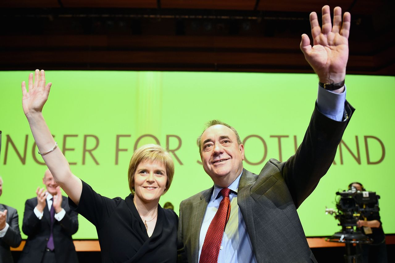 Nicola Sturgeon with Alex Salmond on the day she succeeded him as SNP leader and Scotland's first minister in 2014.