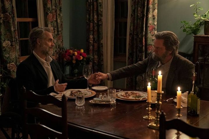 Frank (Murray Bartlett) and Bill (Nick Offerman) sharing a candlelit dinner in Episode 3 of HBO's "The Last of Us."