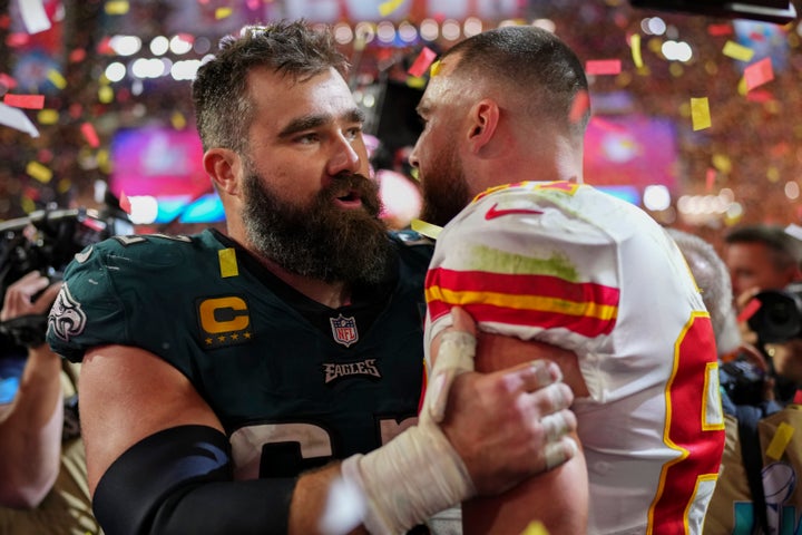 Brothers Jason Kelce of the Philadelphia Eagles and Travis Kelce of the Kansas City Chiefs share a moment after the Super Bowl.