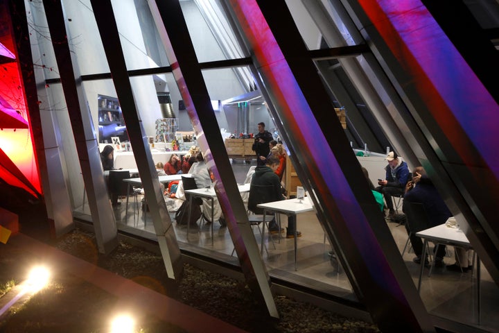 People are seen inside the Broad Art Museum near Berkey Hall on the campus of Michigan State University as they shelter in place, on Feb. 13, 2023, in East Lansing, Mich.