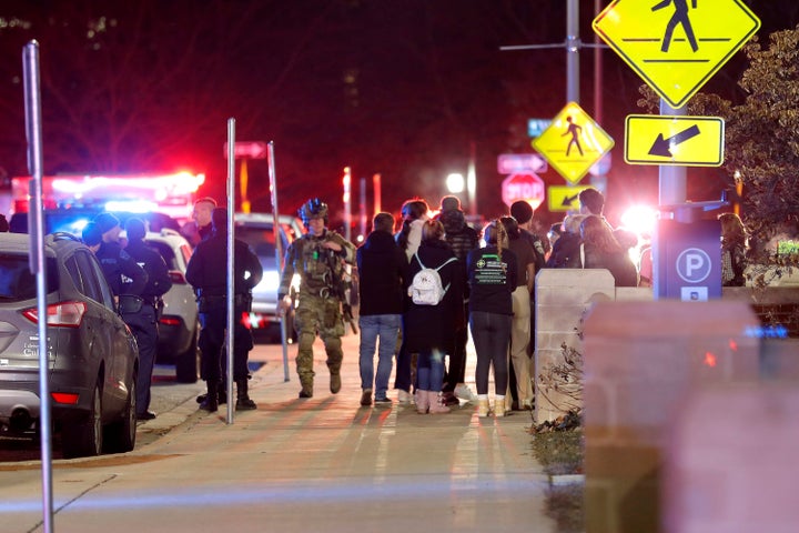 Students gather on the campus of Michigan State University after a shelter in place order was lifted early on Feb. 14, 2023, in East Lansing, Mich.