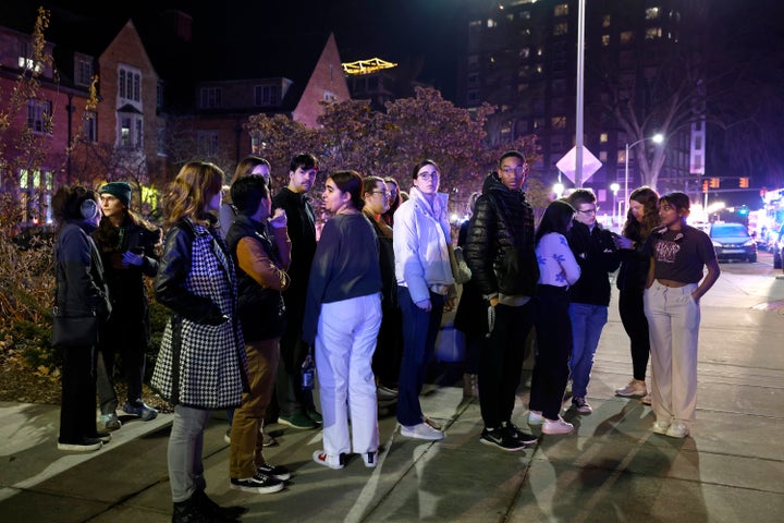 Students gather on the campus of Michigan State University after a shelter in place order was lifted early on Feb. 14, 2023, in East Lansing, Mich.