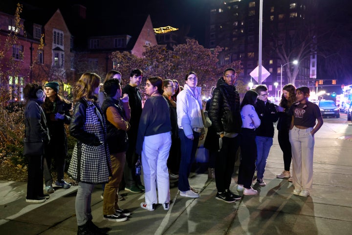 Students gather on the campus of Michigan State University after a shelter in place order was lifted early on Feb. 14, 2023, in East Lansing, Mich. 