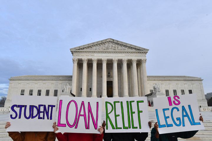 Student loan borrowers are seen gathered at the Supreme Court to tell the court that student loan relief is legal.
