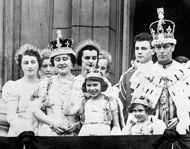 Queen Elizabeth (later the Queen Mother), Princess Elizabeth (later Queen Elizabeth II), Princess Margaret and King George VI after his coronation.
