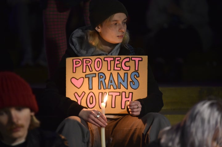 Members of the public attend a candle-lit vigil outside St George's Hall, Liverpool, in memory of transgender teenager Brianna Ghey, who was fatally stabbed in a park on Saturday.