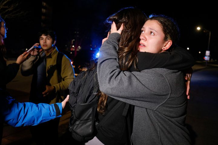 Students hug during an active shooter situation at Michigan State University on Monday in Lansing, Michigan.