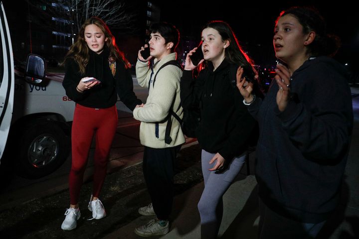 Michigan State University students react during an active shooter situation on campus on Feb. 13, 2023, in East Lansing, Michigan. 
