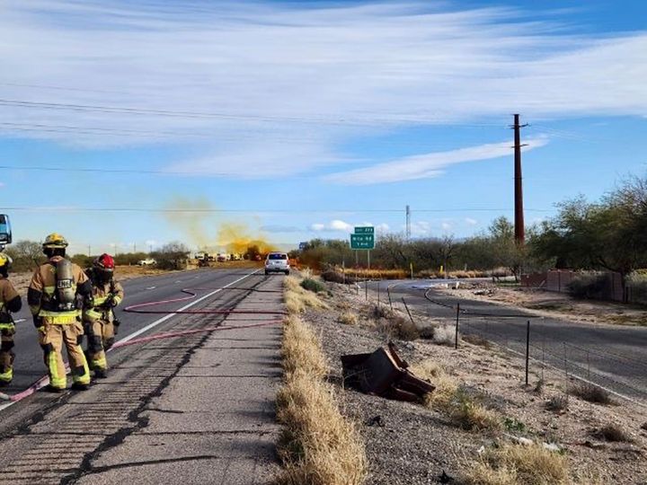 This Tuesday, Feb. 14, 2023, image provided by the Arizona Department of Public Safety shows an accident involving a commercial tanker truck caused a hazardous material to leak onto Interstate 10 outside Tucson, Ariz., prompting state troopers to shut down traffic on the freeway.