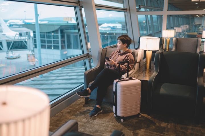 An airport lounge might be cheaper and less of a hassle than going to a hotel for the night.