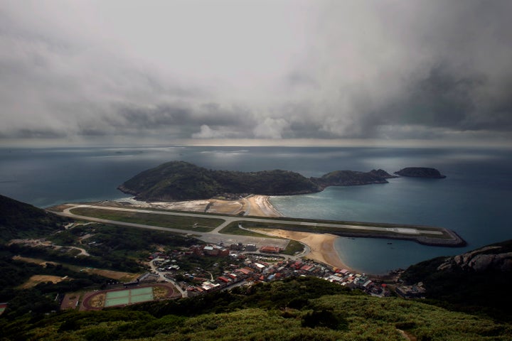 FILE - A view from the 220-meter (670 feet) summit of Mt. Bi looks down on the airport's single runway jutting out into into the sea on Beigan in the Matsu island group, off northern Taiwan. Taiwan’s Defense Ministry says a Chinese weather balloon has landed on Tungyin, a part of Taiwan's Matsu island group off the coast of China’s Fujian province, amid U.S. accusations that such craft have been dispatched worldwide to spy on Washington and its allies.