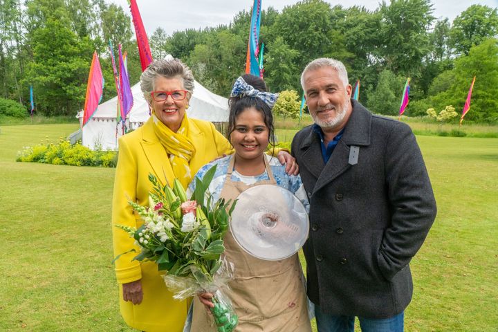 Bake Off winner Syabira Yusoff with judges Paul Hollywood and Prue Leith
