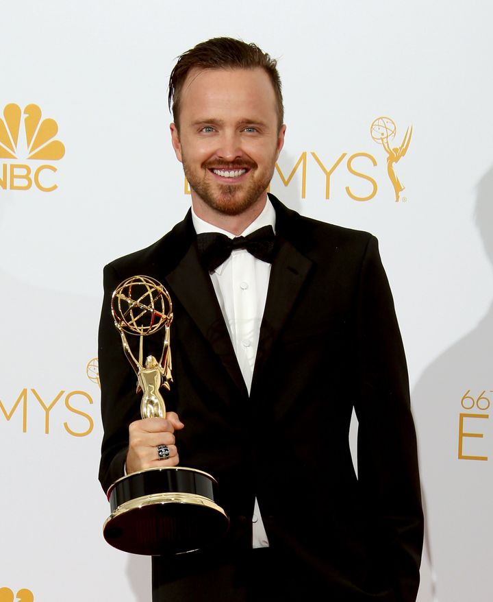 Aaron Paul with his third Emmy in 2014