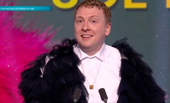 Joe Lycett on stage at the National Comedy Awards