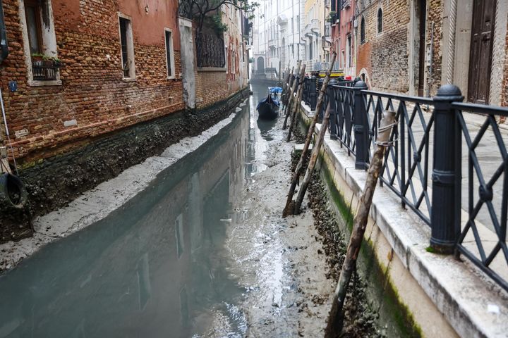 A general view of a dry canal for low tide on February 16, 2023 in Venice, Italy (Photo by Alessandro Bremec/NurPhoto via Getty Images)