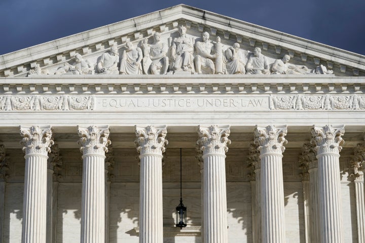 FILE - The U.S. Supreme Court is seen on Jan. 20, 2023, in Washington. A landmark Supreme Court decision on the Second Amendment is dismantling gun law across the country, dividing judges and sowing confusion over what firearm restrictions can remain on the books. Experts say the high court’s ruling that outlined a new test for evaluating gun laws left open many questions, resulting in an increasing number of conflicting decisions as lower court judges struggle to figure out how to apply it. (AP Photo/Alex Brandon, File)