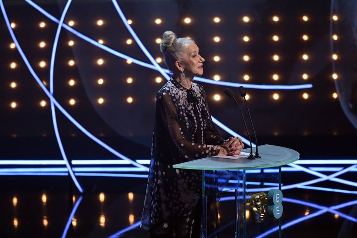 Dame Helen Mirren speaks on stage during the EE BAFTA Film Awards 2023 at The Royal Festival Hall on February 19, 2023 in London, England. (Photo by Kate Green/BAFTA/Getty Images for BAFTA)