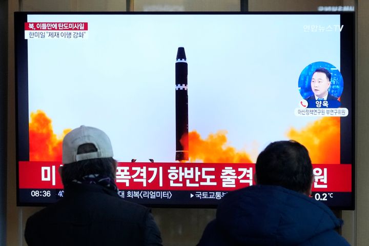 A TV screen shows a file image of North Korea's missile launch during a news program at the Seoul Railway Station in Seoul, South Korea on Monday.