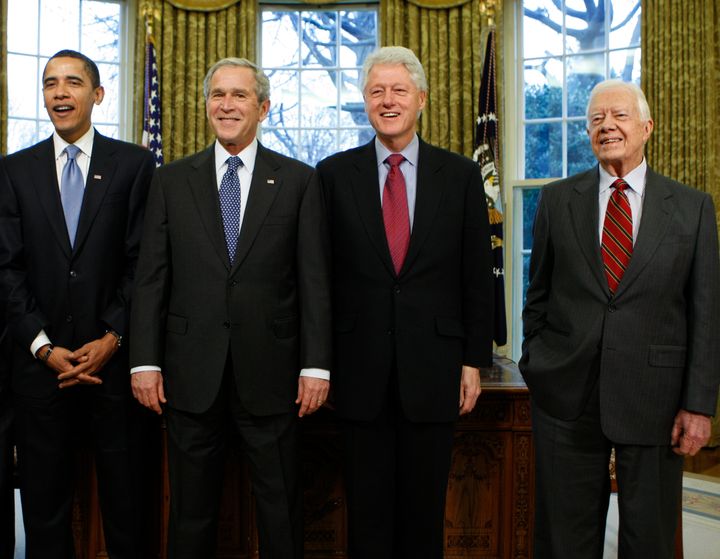 Barack Obama, George W. Bush, Bill Clinton and Jimmy Carter in the Oval Office in 2009. Former President George H.W. Bush, who died in 2018, also joined this gathering of ex presidents shortly after Obama's election.