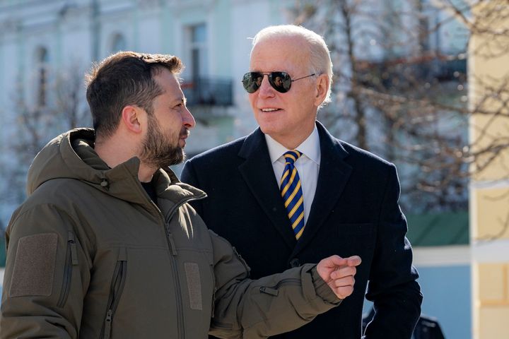 President Joe Biden, right, and Ukrainian President Volodymyr Zelenskyy talk during an unannounced visit in Kyiv, Ukraine.