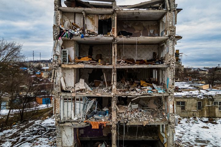 A residential building damaged by shelling in Izyum, Kharkiv region on February 20, 2023.
