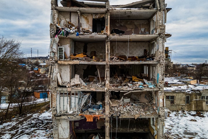 A residential building damaged by shelling in Izyum, Kharkiv region on February 20, 2023.