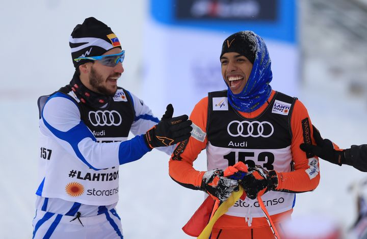 LAHTI, FINLAND - FEBRUARY 23: Adrian Solano (R) of Venezuela is congratulated by Bernardo Baena of Venezuela after crossing the finish line in the Men's 1.6KM Cross Country Sprint qualification round during the FIS Nordic World Ski Championships on February 23, 2017 in Lahti, Finland. (Photo by Richard Heathcote/Getty Images)