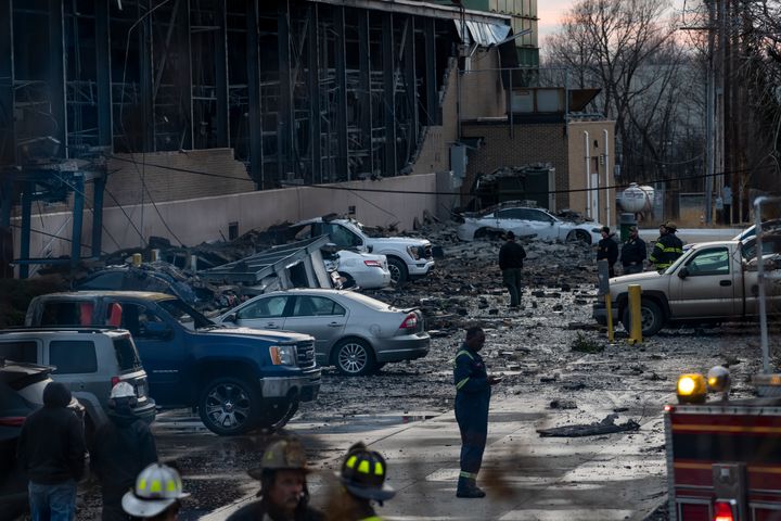 Debris covers the ground and nearby cars after an explosion at the I. Schumann & Co. metals plant in Bedford, Ohio.