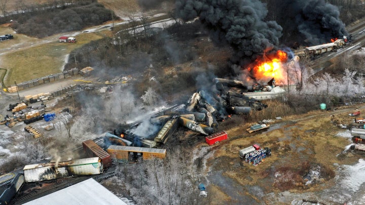 Drone footage shows part of a Norfolk Southern freight train still burning a day after it derailed in East Palestine, Ohio.  Transportation Secretary Pete Buttigieg announced a package of reforms to improve safety on Tuesday, two days after he warned Norfolk Southern to keep its promise to clean up the mess and help the city recover.