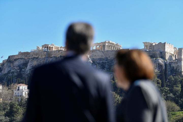 U.S. Secretary of State Antony Blinken accompanied by Lina Mendoni, Greek Minister of Culture and Sports look at the Acropolis hill during a visit to the ancient Agora in Athens, Greece February 21, 2023. Michael Varaklas/Pool via REUTERS