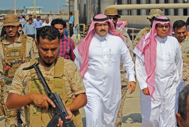 Saudi ambassador to Yemen Mohammed Said Al-Jaber (center) arrives in the southern Yemeni port of Aden to oversee an aid delivery of fuel from Saudi Arabia on October 29, 2018.