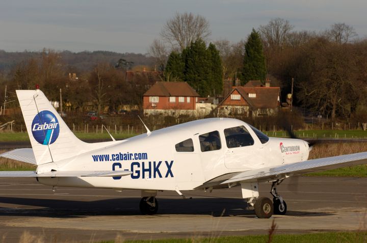 The pilot was flying around in a Piper PA-28-161, a similar one pictured, when the instructor had a fatal heart attack. 