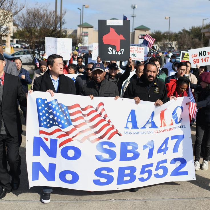 Texas state Rep. Gene Wu; Houston Mayor Sylvester Turner, Reps. Al Green and Sheila Jackson Lee, join a protest in Houston against a bill that would forbid Chinese nationals from buying properties in Texas, on Feb. 11.