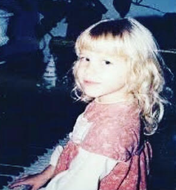 The author at the piano at age 3.