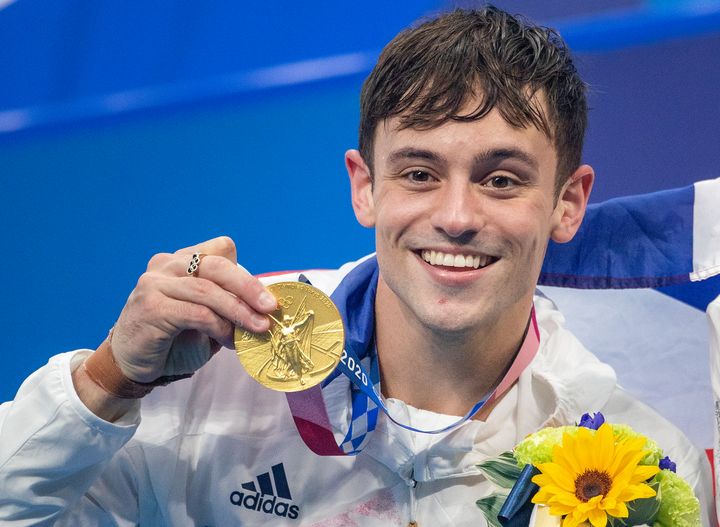 Diver Tom Daley received the gold medal in the men’s synchronized 10-meter platform at the 2020 Summer Olympics.