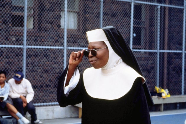 Whoopi Goldberg in character as Deloris Van Cartier