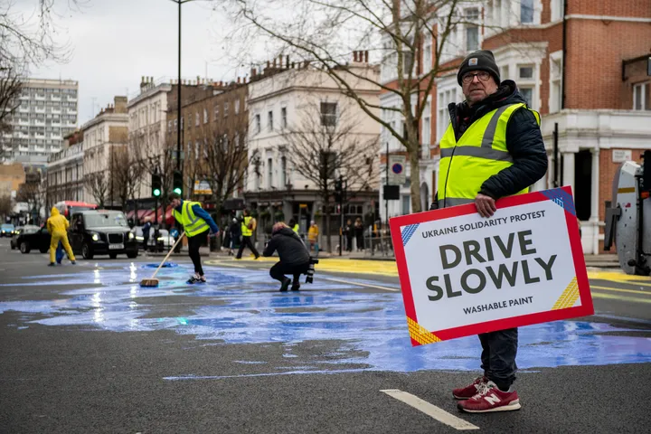 painted road in front of Russian embassy in Ukrainian colours in London