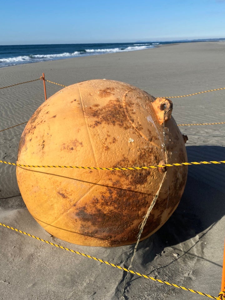 Mysterious Metal Sphere Washes Up On Japanese Beach, Sparking Investigation 2 Another view of the “Godzilla egg.”
