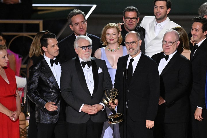 "Succession" creator Jesse Armstrong (center) accepts the Emmy for Outstanding Drama Series for "Succession" along with cast and crew at the 74th Emmy Awards in Los Angeles on Sept. 12, 2022.