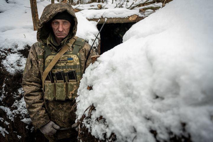 Ukrainian soldiers man snow-covered trenches along the frontline in the southern Donbas area of Druzhba, Ukraine, on February 18, 2023.