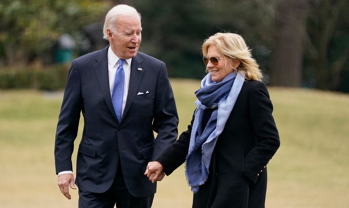 President Joe Biden and first lady Jill Biden arrive on the South Lawn of the White House, Monday, Jan. 23, 2023, in Washington. (AP Photo/Evan Vucci)