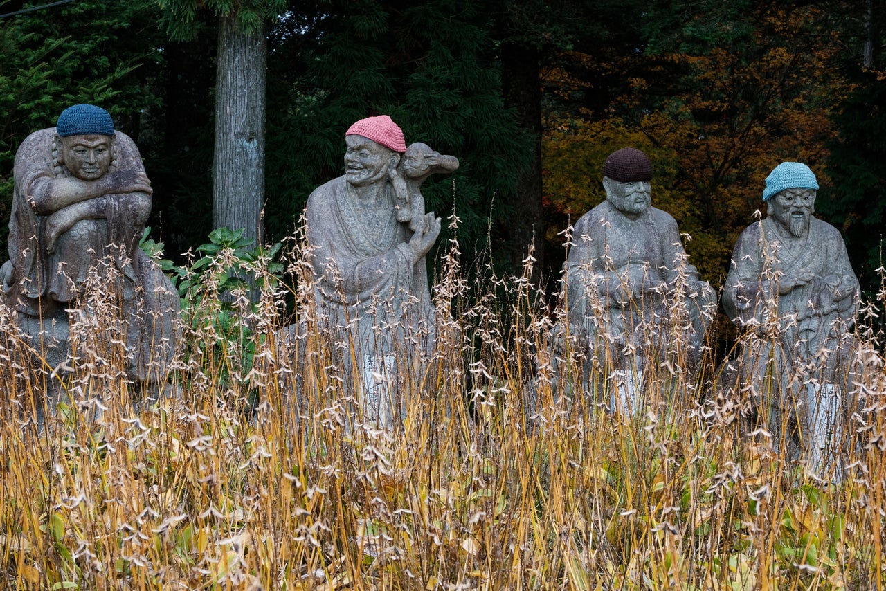 Four of the 500 rakan statues at Unpenji, Shikoku.