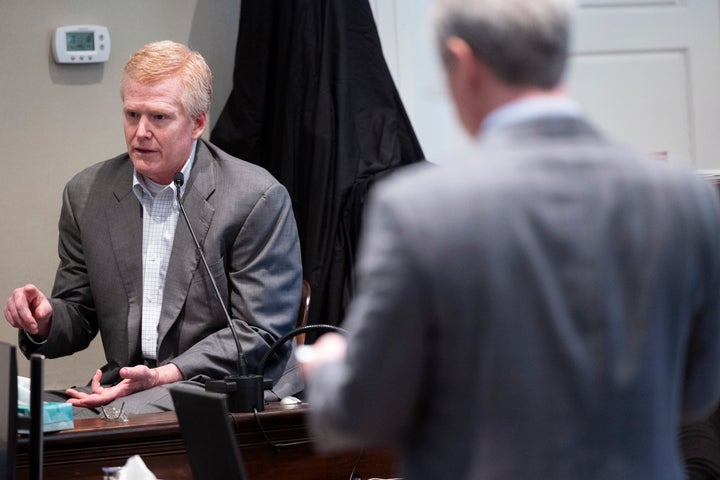 Defendant Alex Murdaugh is cross examined by prosecutor Creighton Waters while testifying in his murder trial on Friday.