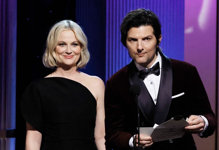 Amy Poehler (left) and Adam Scott at the 2023 SAG Awards. 