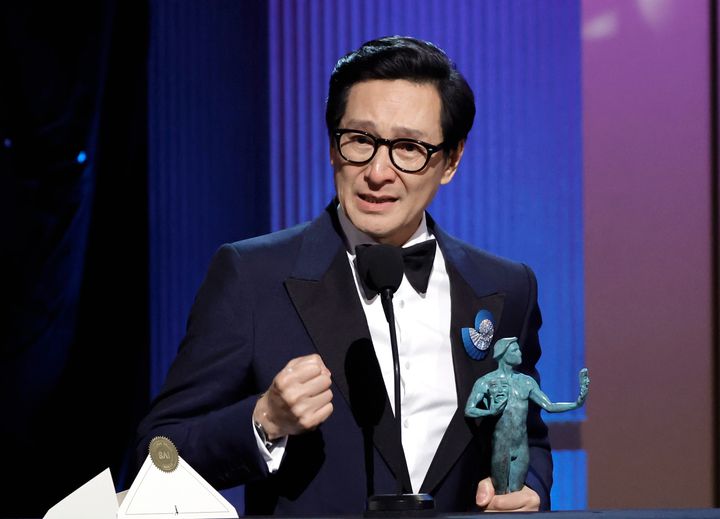 Ke Huy Quan accepts the Outstanding Performance by a Male Actor in a Supporting Role award for “Everything Everywhere All at Once” onstage during the 29th Annual Screen Actors Guild Awards at Fairmont Century Plaza on Sunday in Los Angeles.