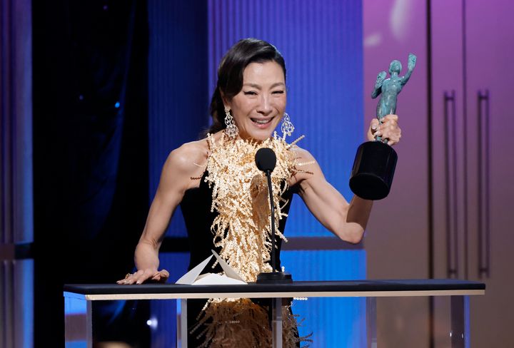 Michelle Yeoh accepts the Outstanding Performance by a Female Actor in a Leading Role for "Everything Everywhere All at Once" onstage during the 29th SAG Awards on Feb. 26 in Los Angeles.