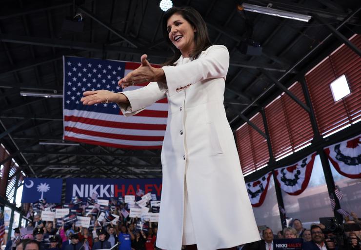 Republican presidential candidate Nikki Haley gestures to family members while arriving at her first campaign event on Feb. 15, 2023, in Charleston, South Carolina. She is the first Republican opponent to challenge former President Donald Trump.