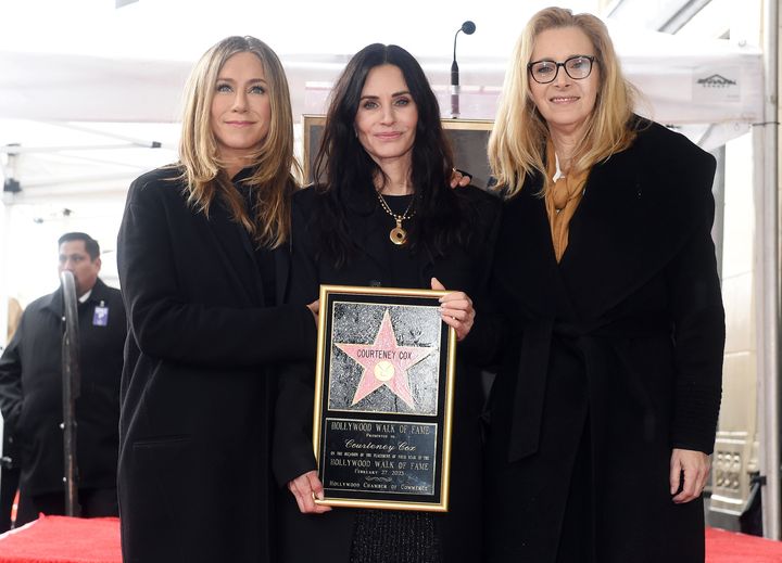 Jennifer Aniston and Lisa Kudrow appear with Courteney Cox at the "Friends" star's Hollywood Walk of Fame ceremony on Monday.