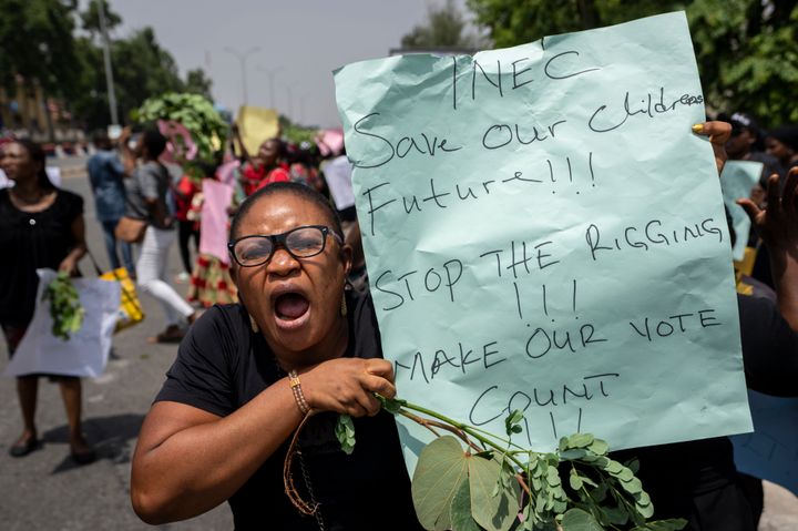 Demonstrators accusing the election commission of irregularities and disenfranchising voters make a protest in downtown Abuja, Nigeria, on Feb. 28, 2023.